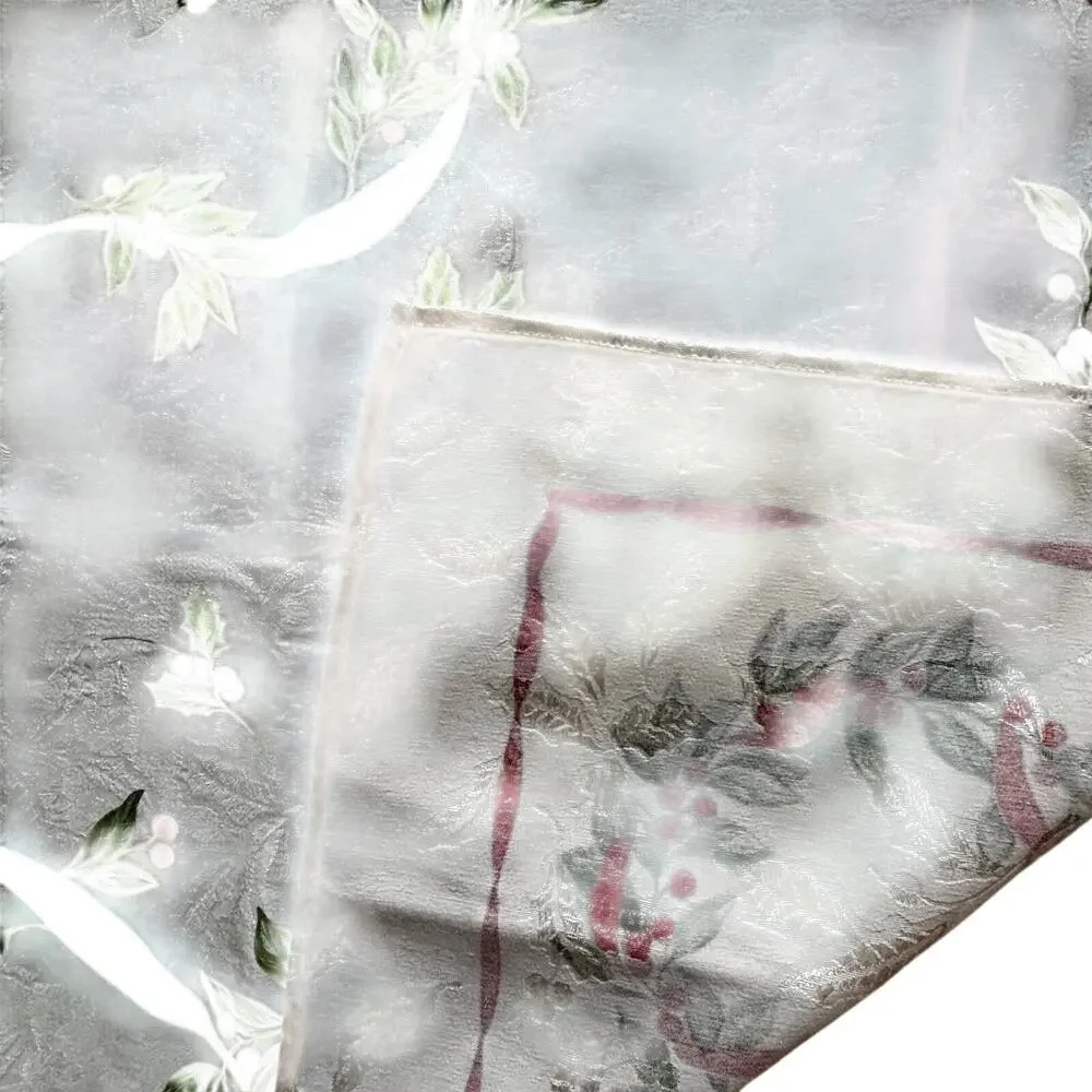 Vintage Christmas tablecloth creamy white brocade red green ribbon holly design